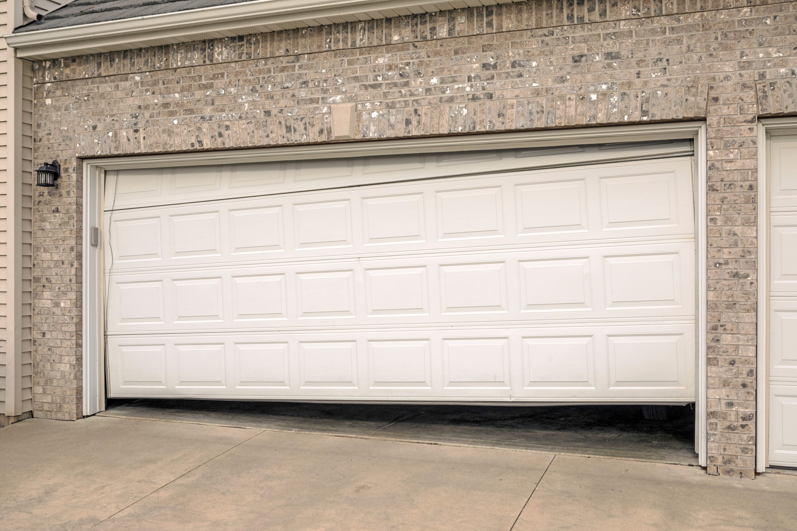 Garage Door with broken tracks